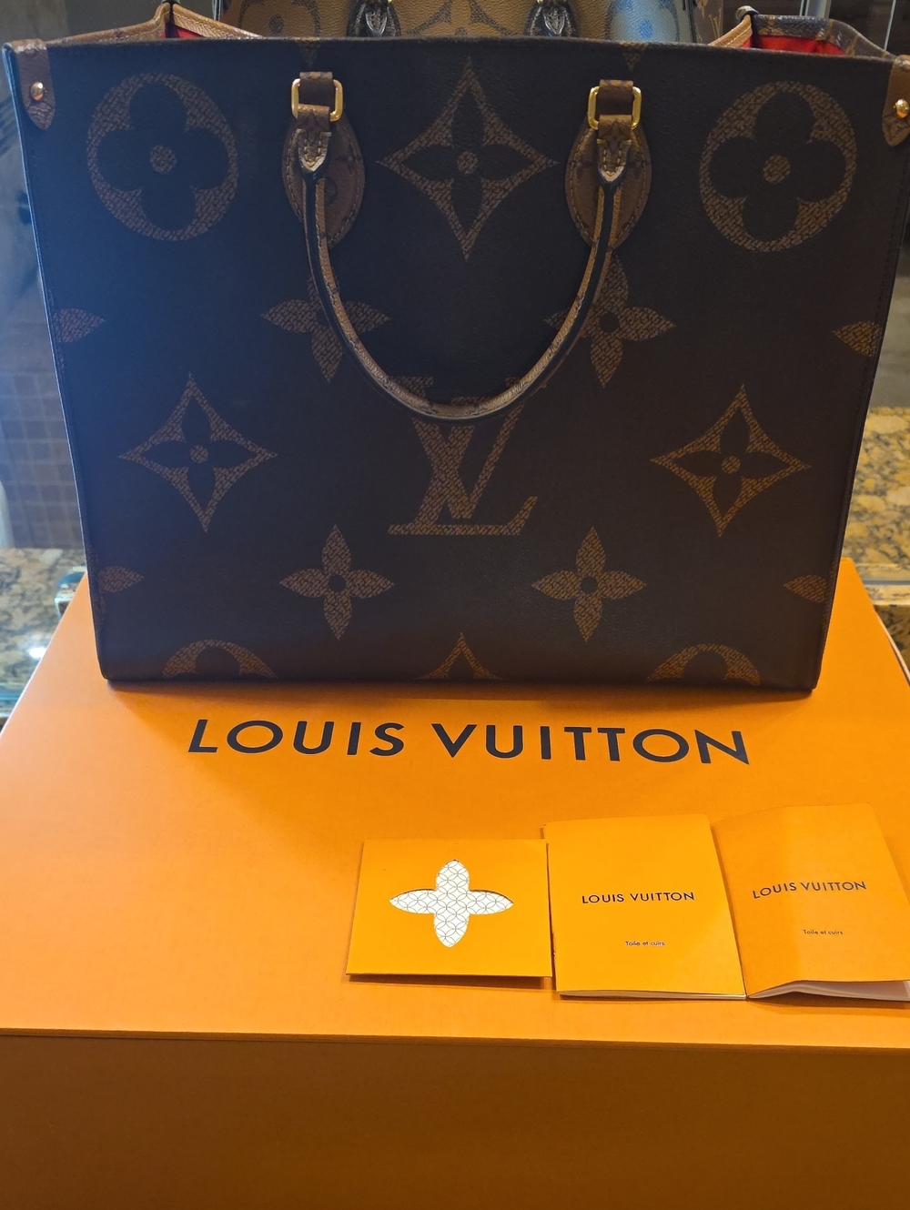 Louis Vuitton Large Monogram Canvas Tote Shoulder Bag in Brown and Tan.